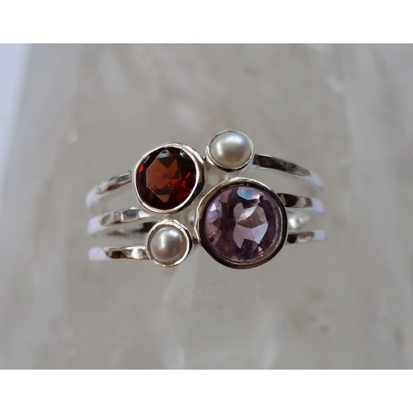 All genuine gems set into 925 sterling silver ring.