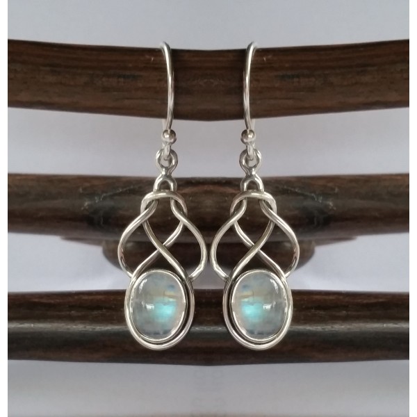 Sterling silver knot style earring with 7 x 9 mm gemstone.