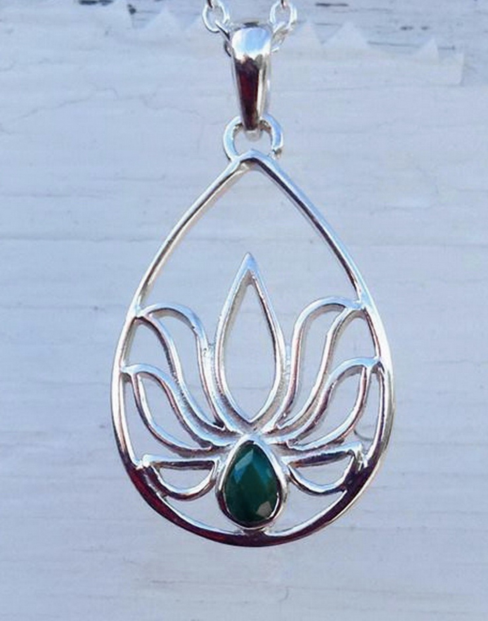 P638 Sterling silver lotus pendant adorned with faceted pear shaped genuine gemstone