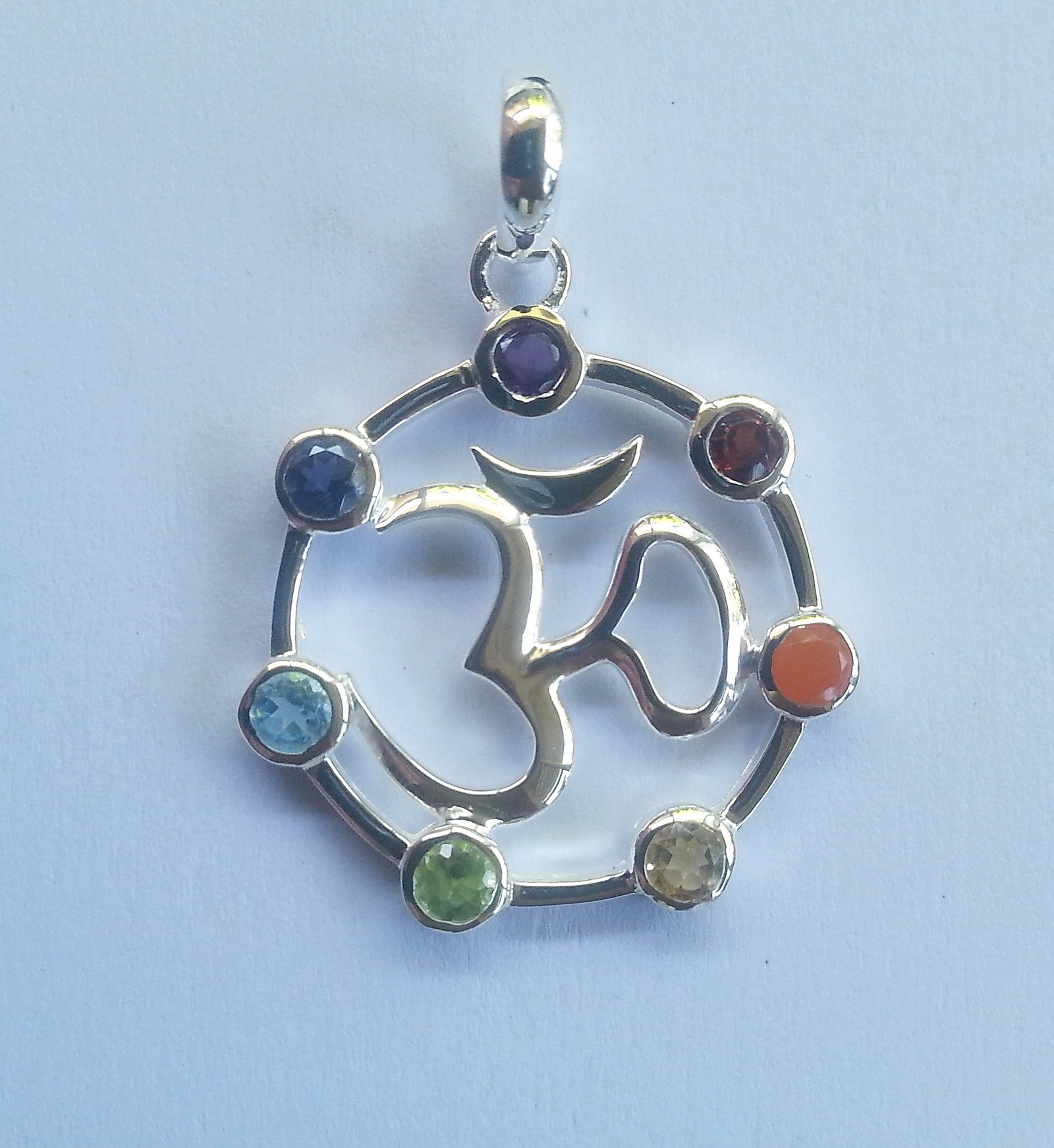 Om symbol with 7 chakra gemstones set in sterling silver