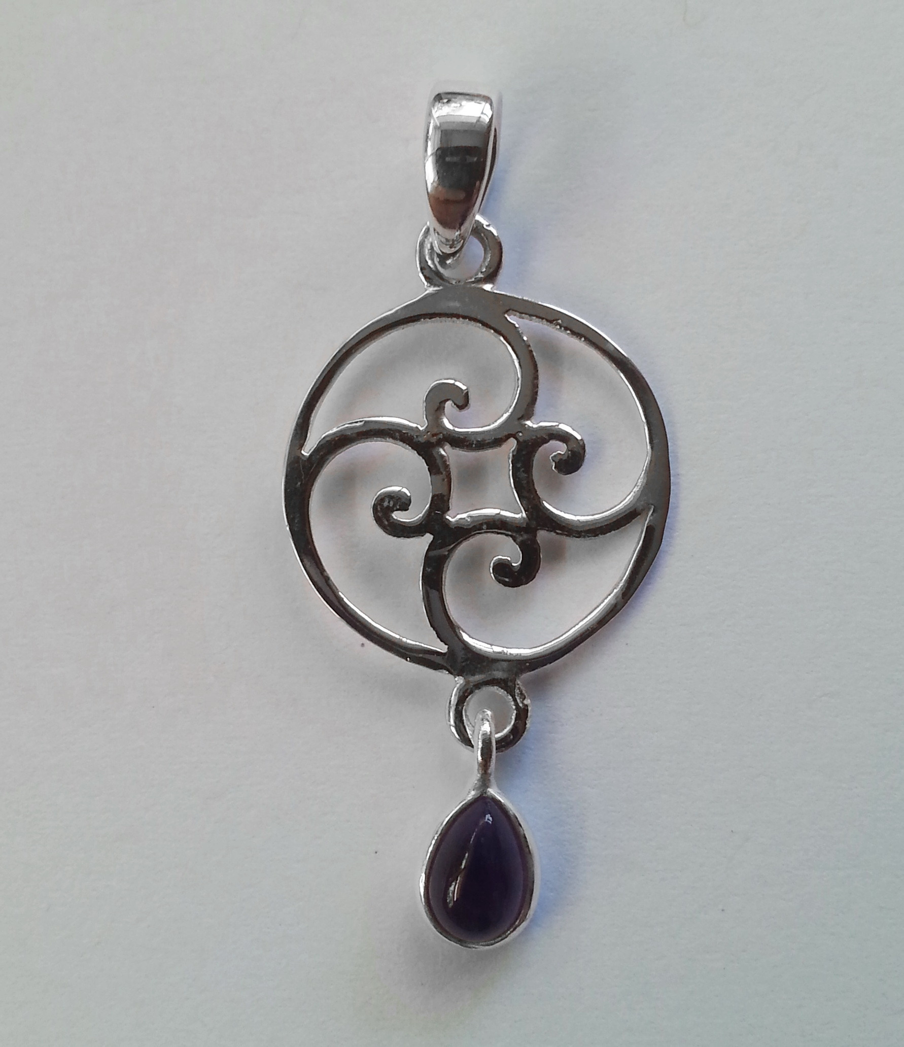 Sterling silver pendant symbolic of continuous flow and constant change with genuine gemstone drop