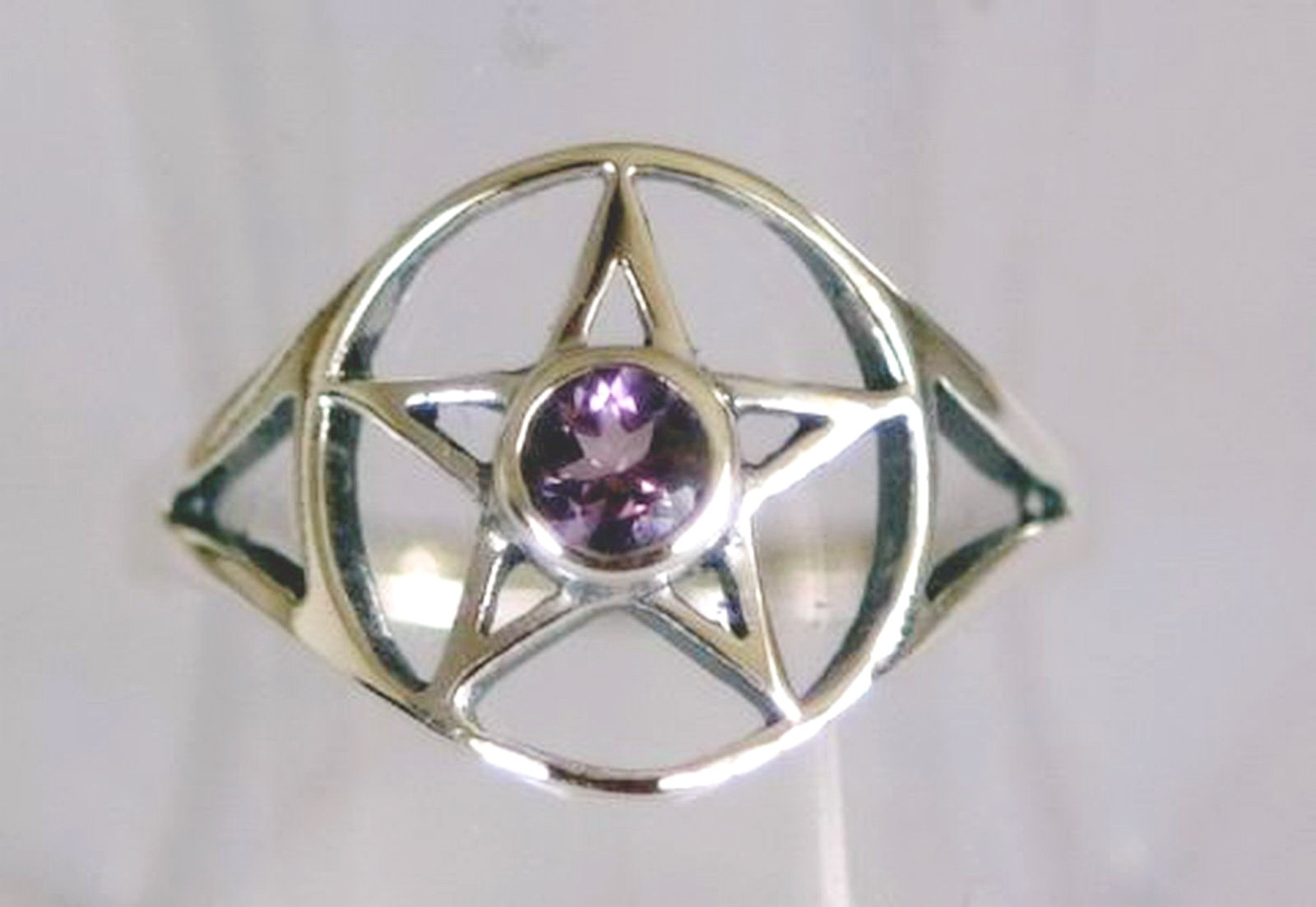 R534 pentagram ring with faceted stone 