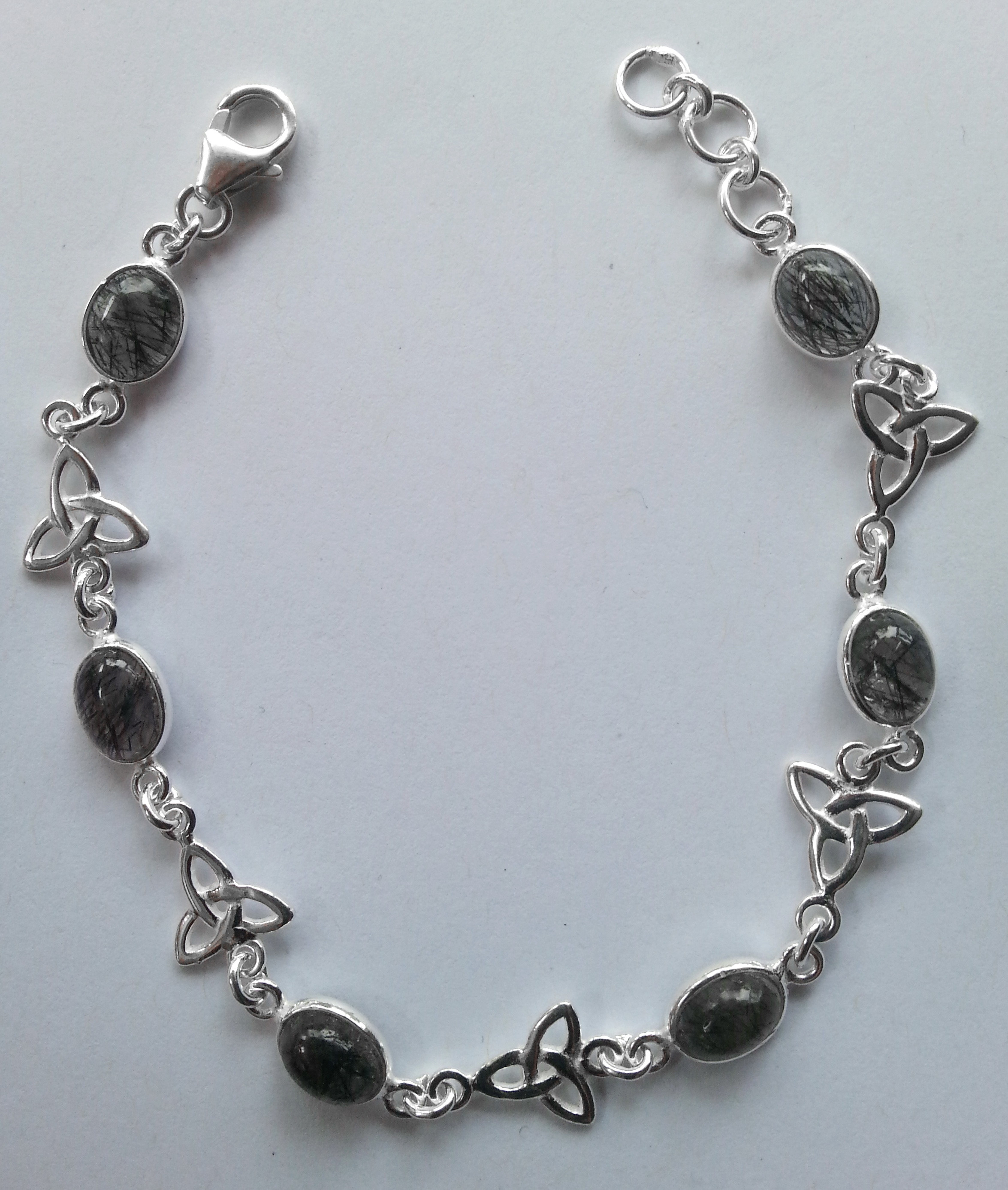 Sterling silver triquetra bracelet with gemstones